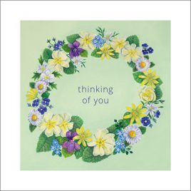 Thinking of you card featuring pretty Devon wild flowers in a wreath design on a green background.