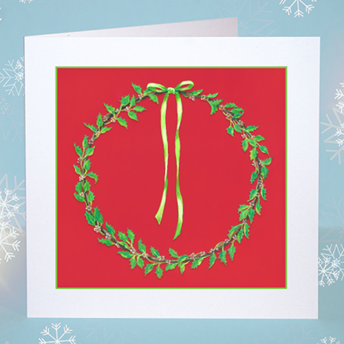 Holly Wreath Christmas Card Original Christmas card featuring a traditional holly wreath with a green ribbon on a red background