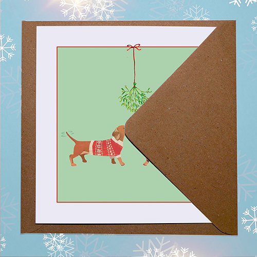 Original Christmas card design featuring two sausage dogs in Christmas jumpers with envelope
