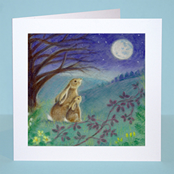 Greetings card featuring original pastel illustration of moongazing hares